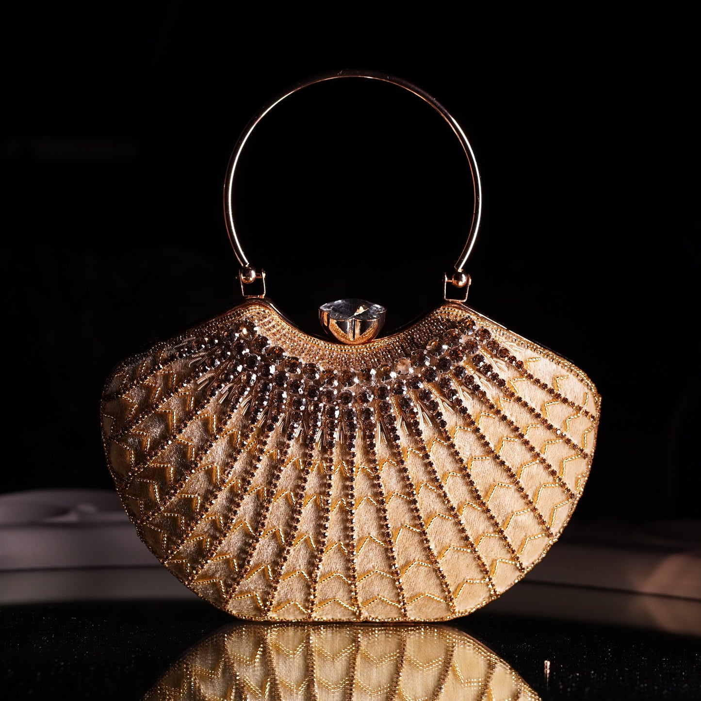 designer clutch with hand strap