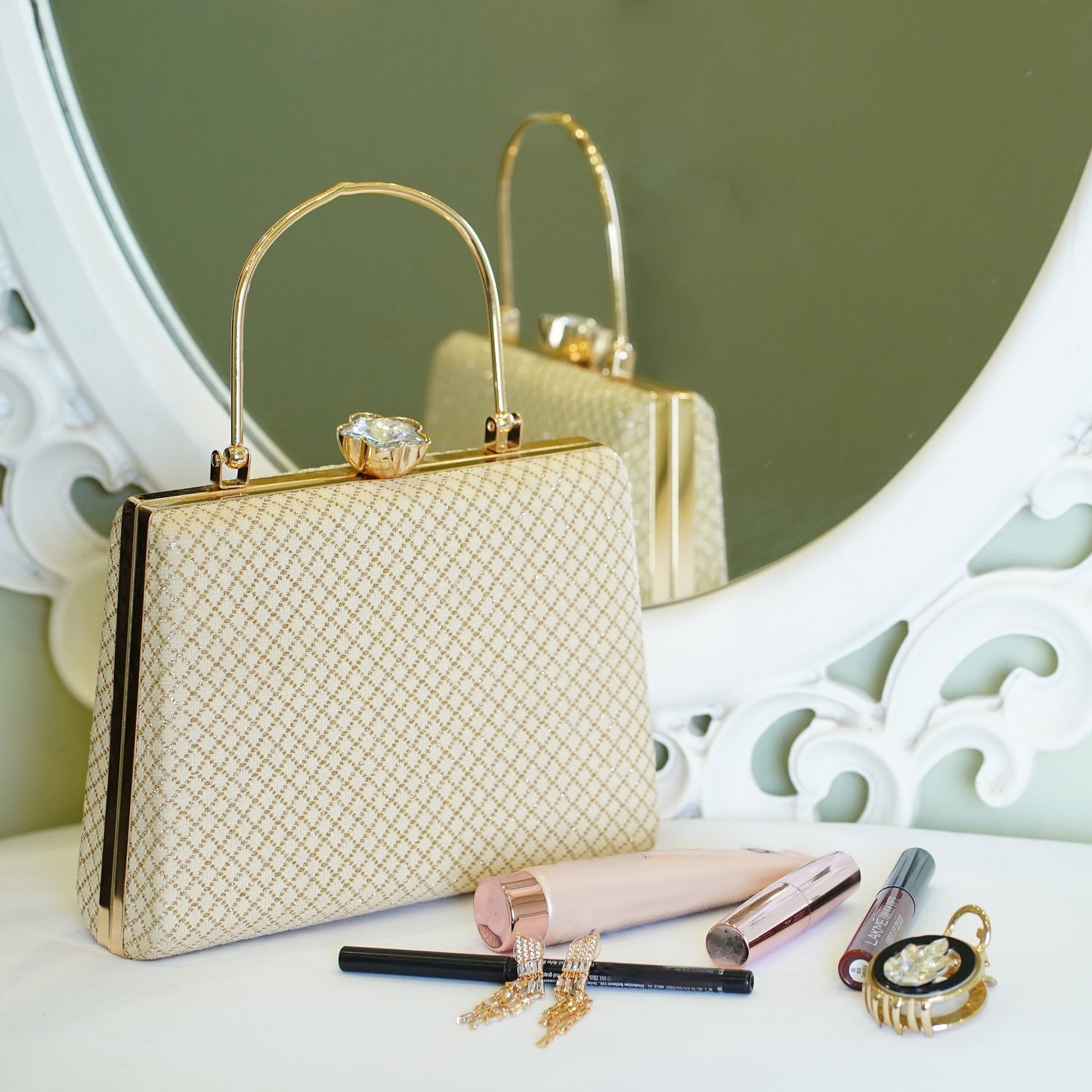 cream designer clutch bag
