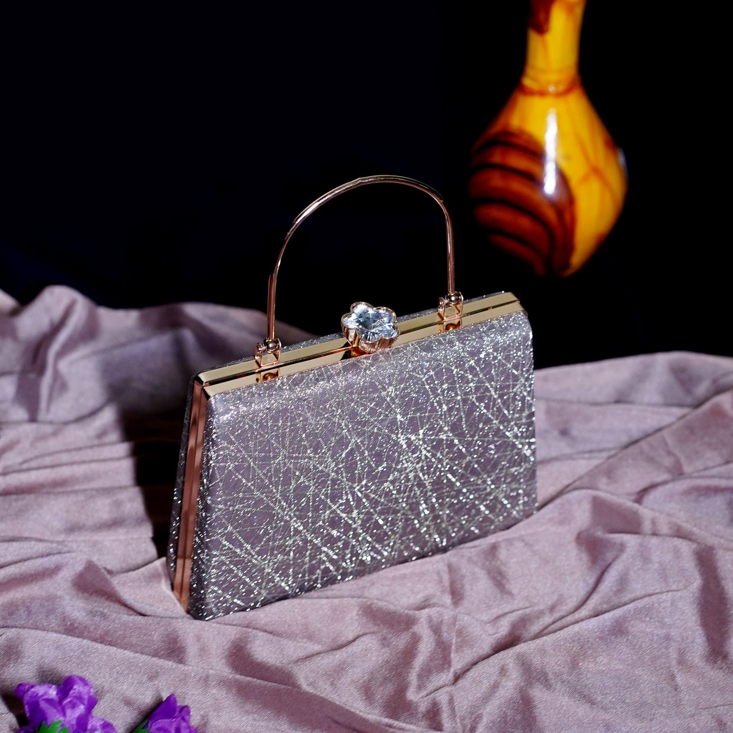 grey designer clutch bag
