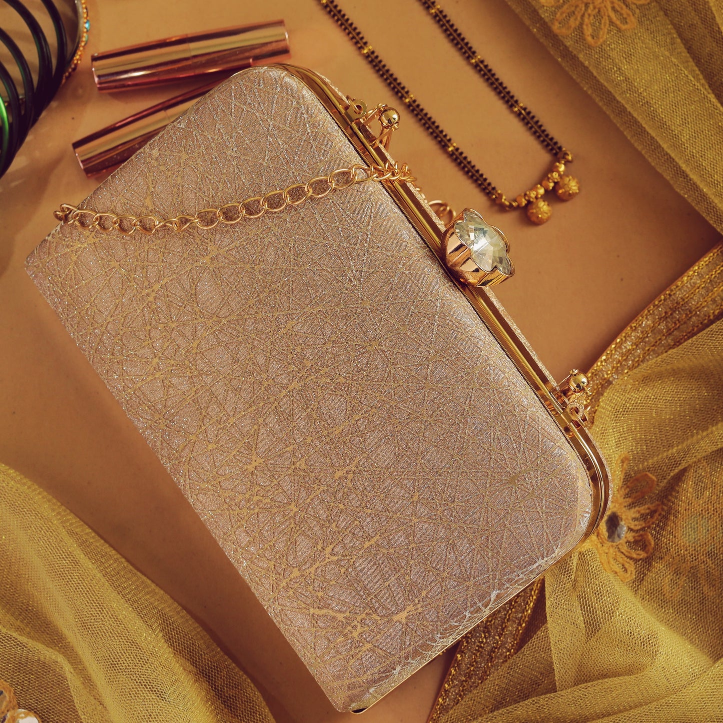 beige clutch designer