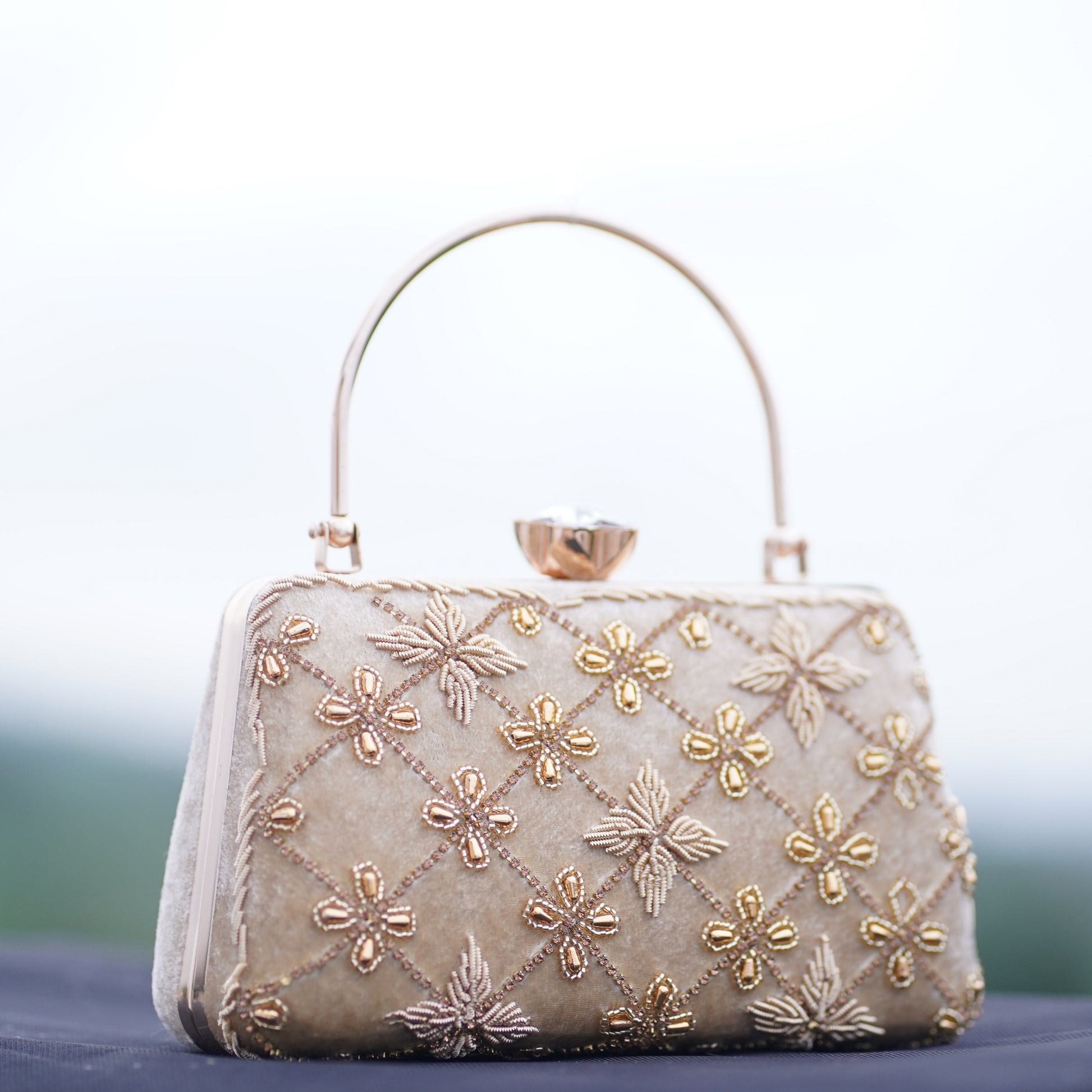designer clutch beige