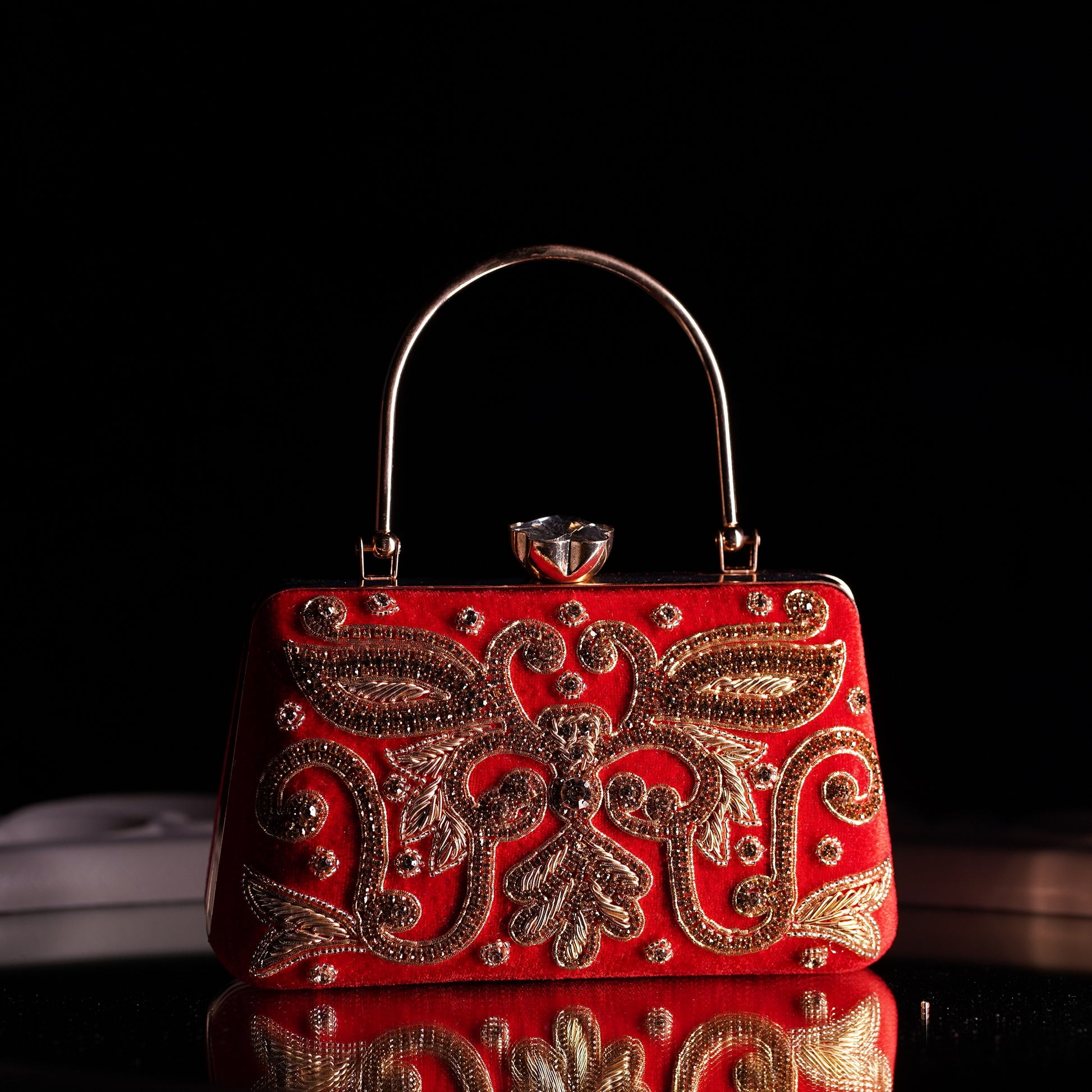 red clutch bag designer
