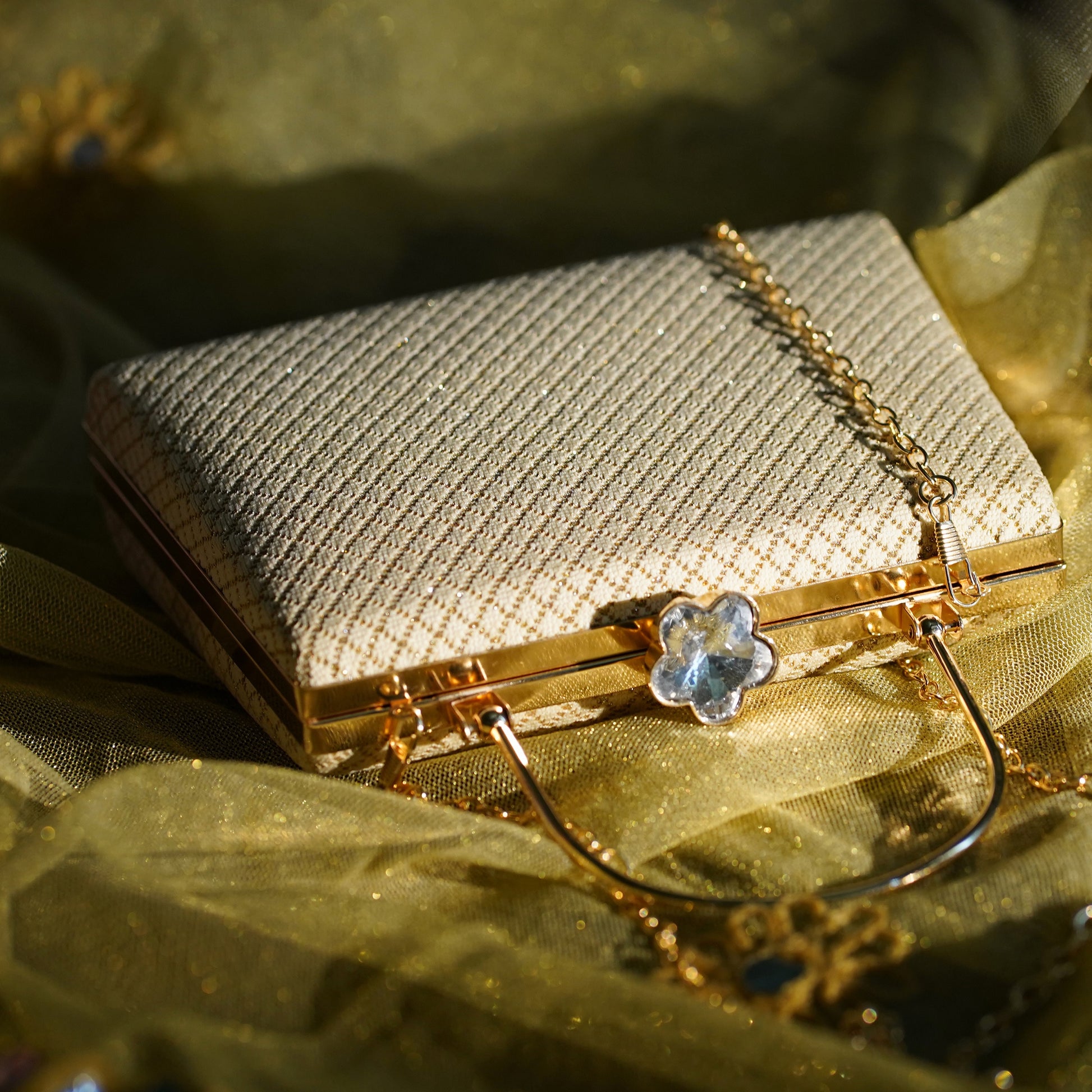 cream designer clutch bag