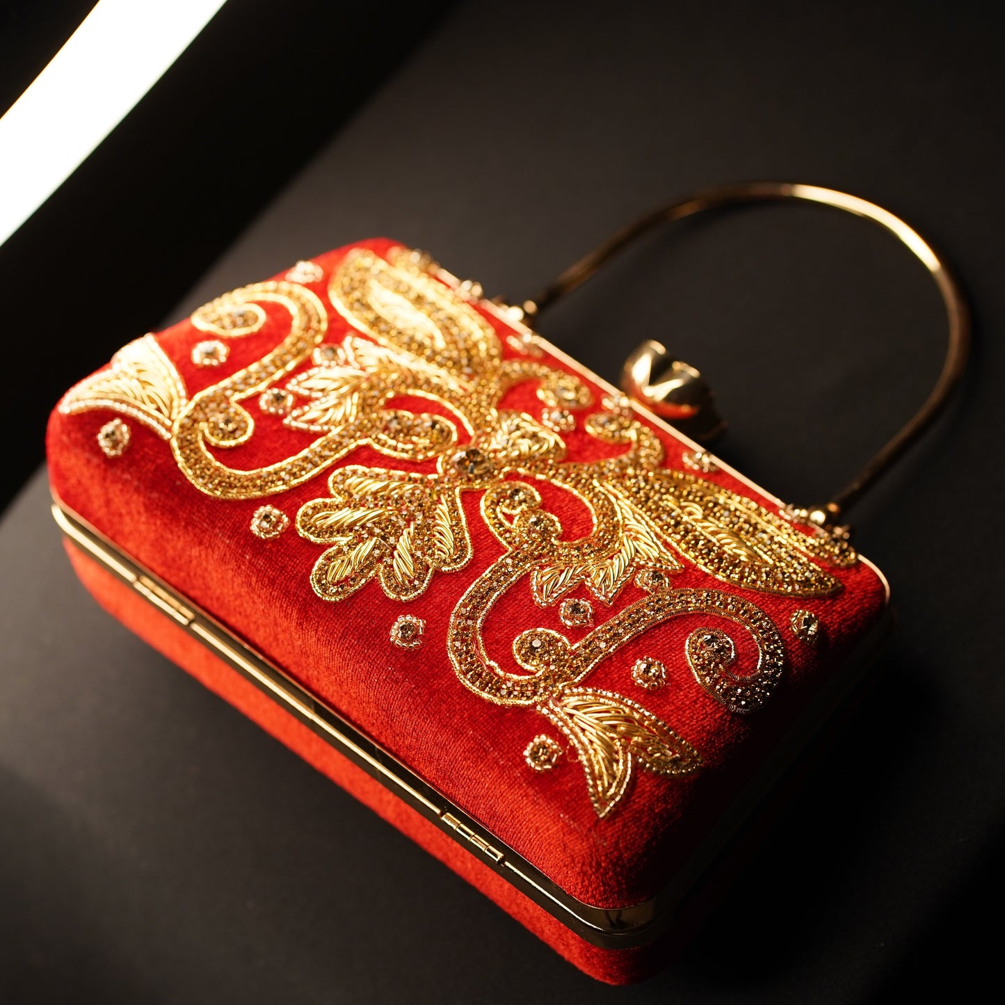 red clutch bag designer
