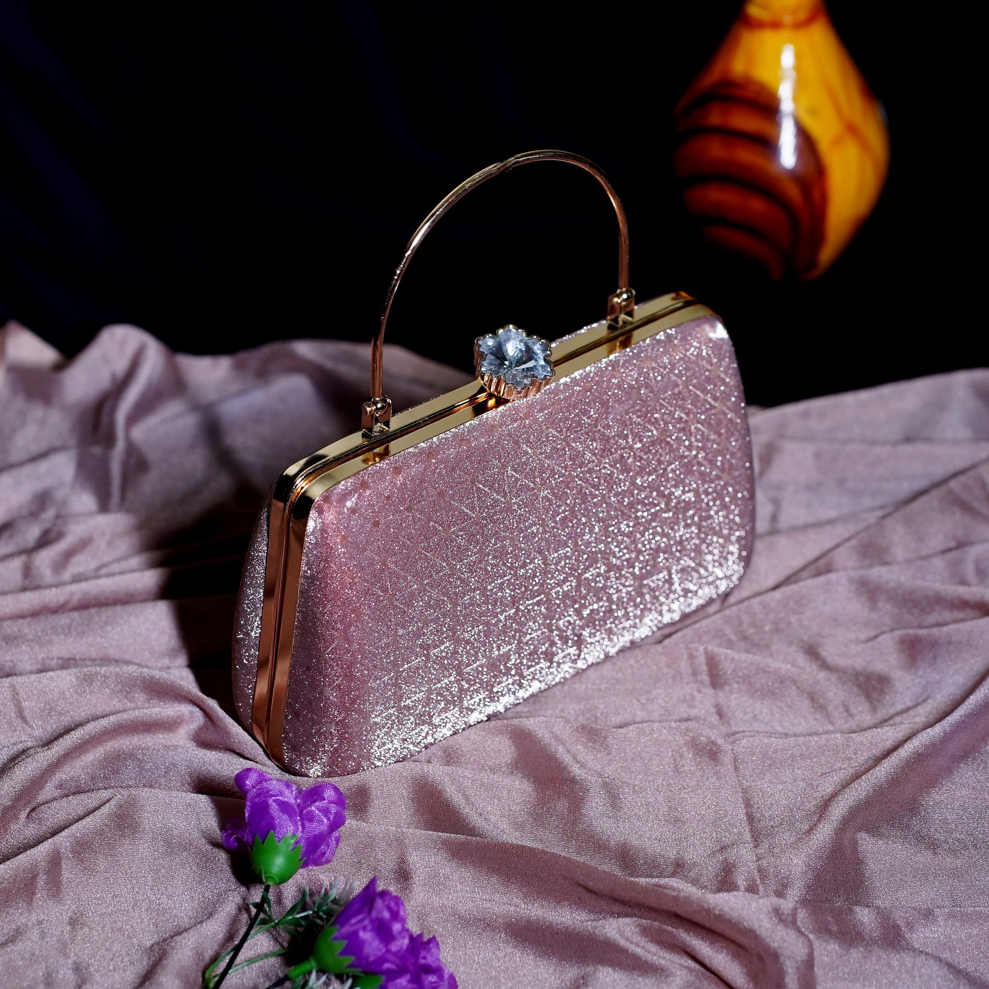 pink designer clutch bags