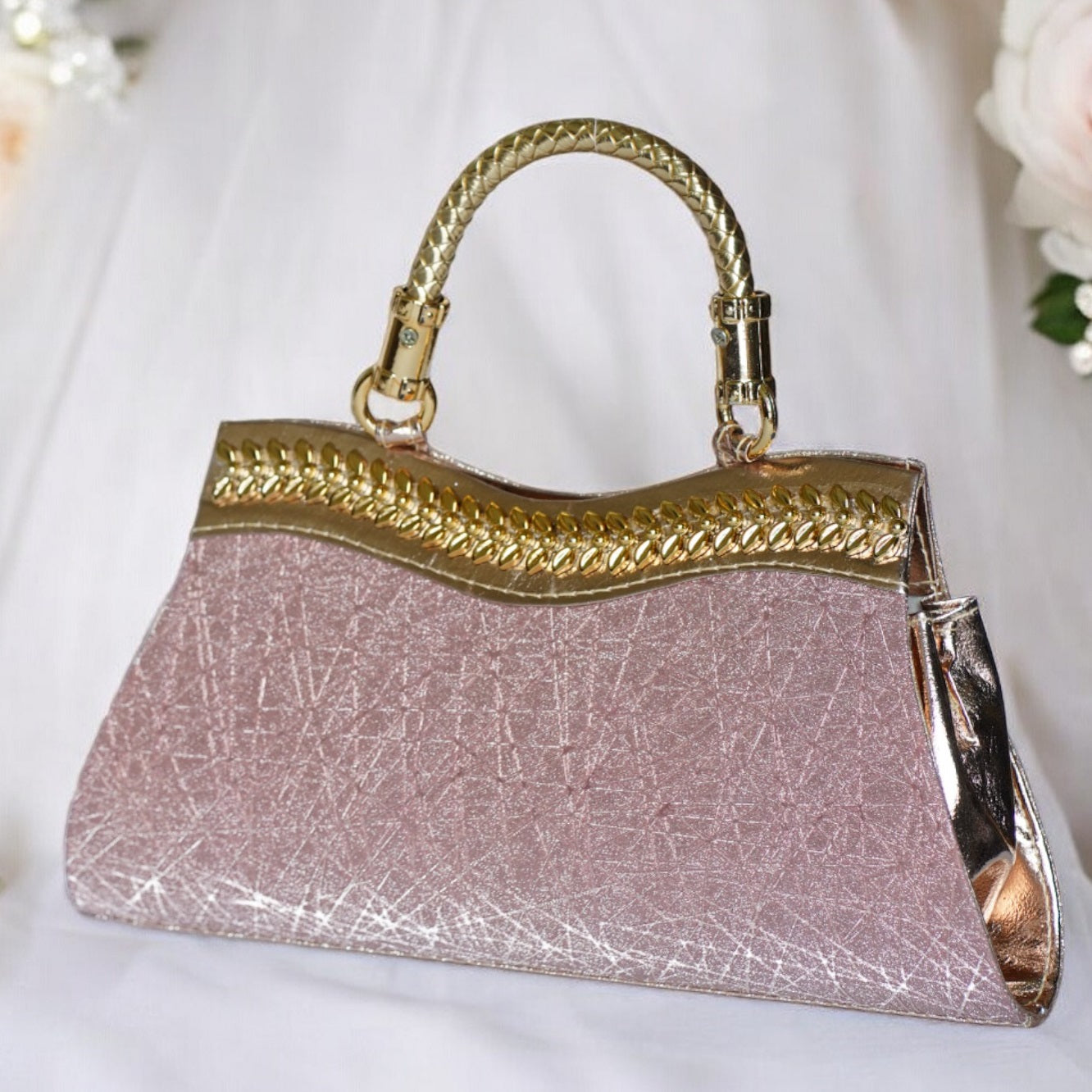 pink designer clutch