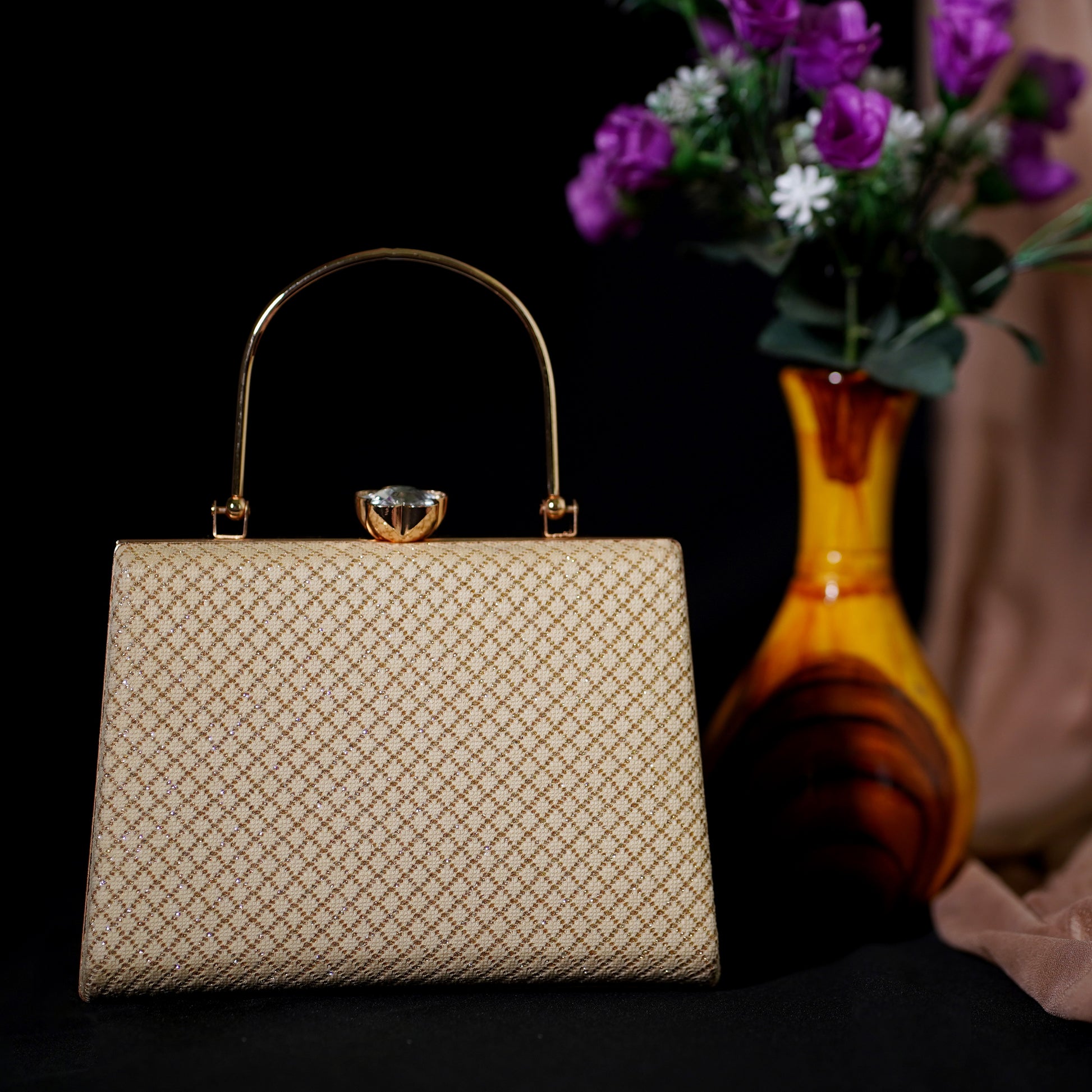 cream designer clutch bag