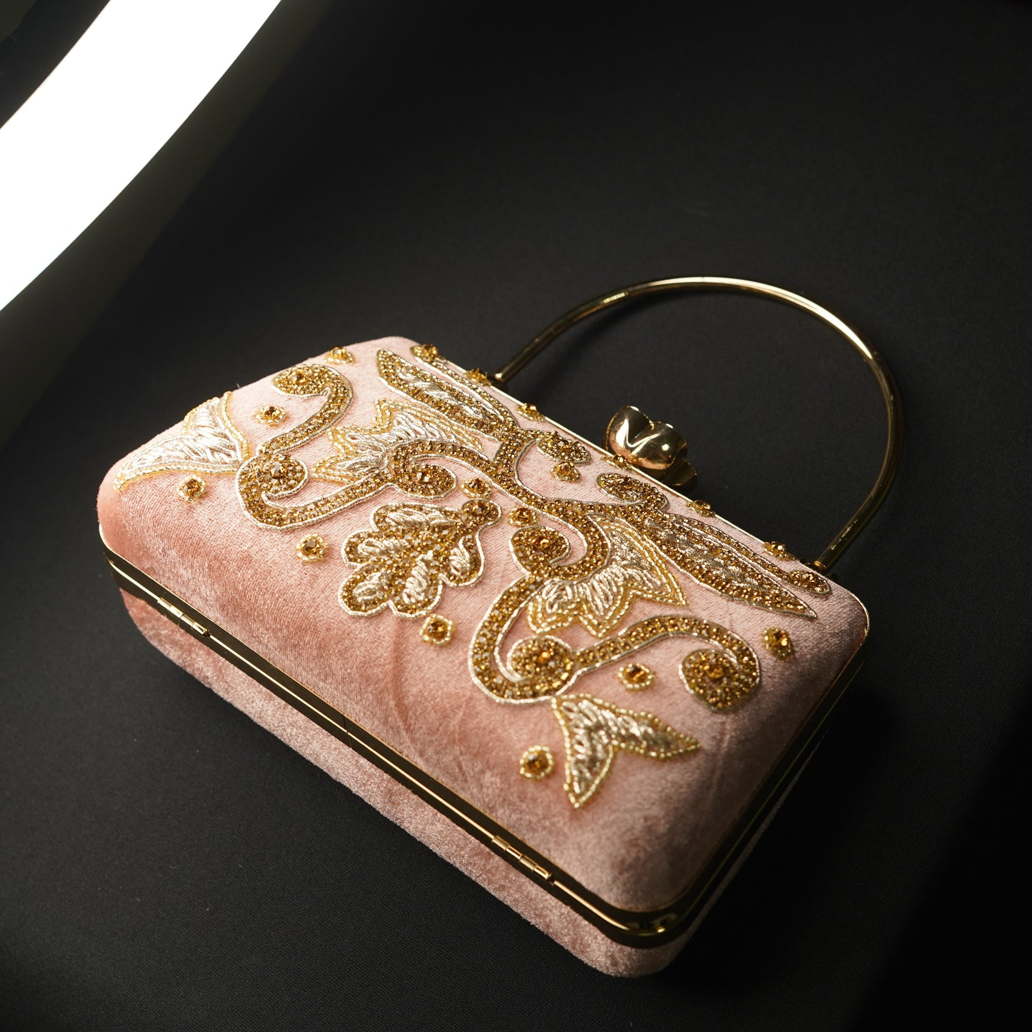 designer pink clutch