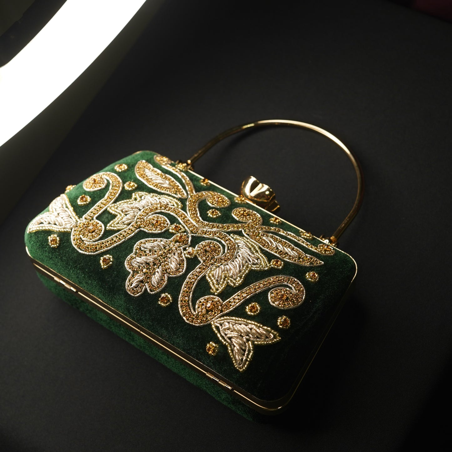 green designer clutch bag