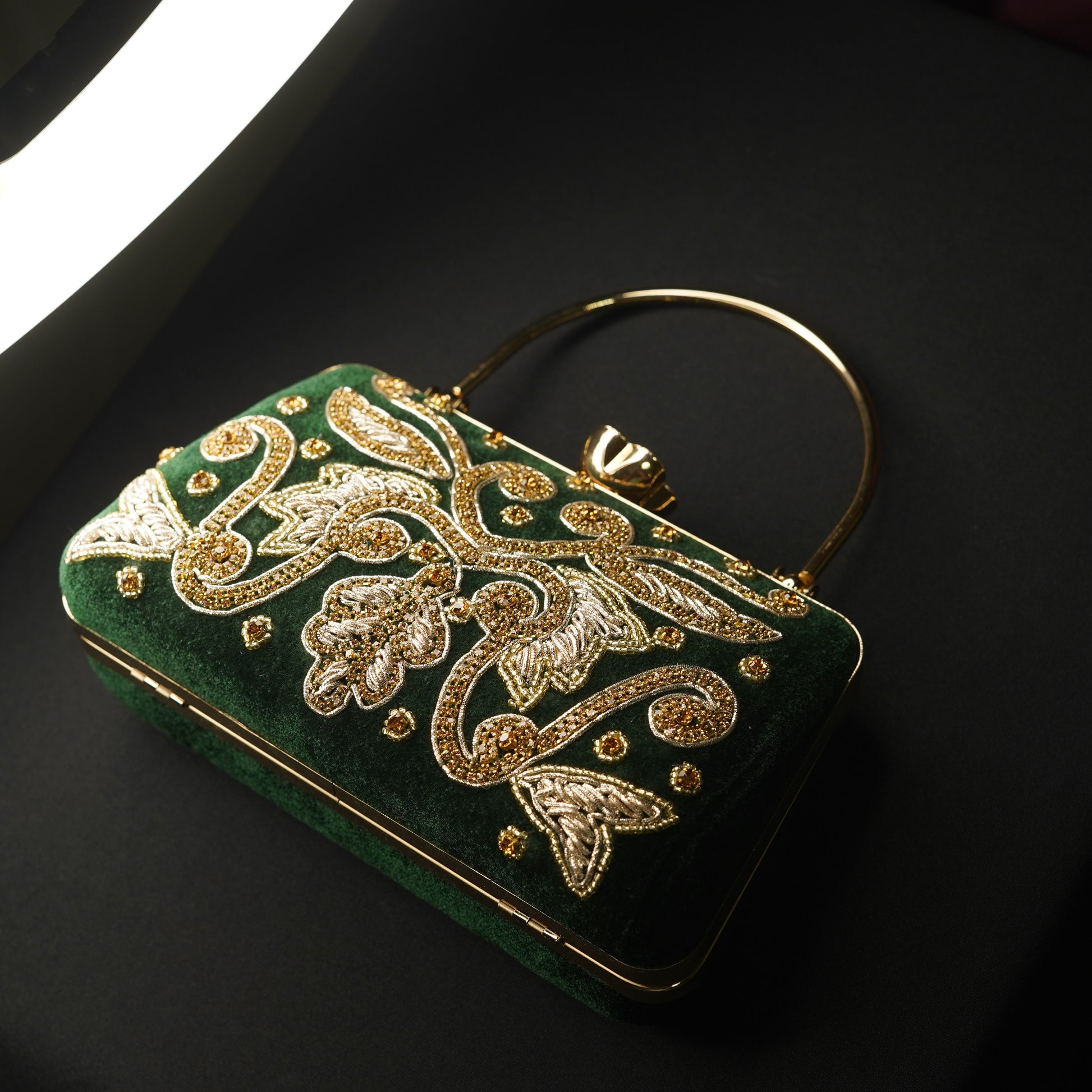 green designer clutch bag